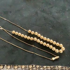 Beautiful gift..add a ball 14 kt necklace.  28 balls, 30 in  length 10 gram